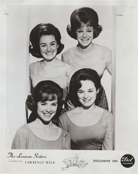 an old black and white photo of four women