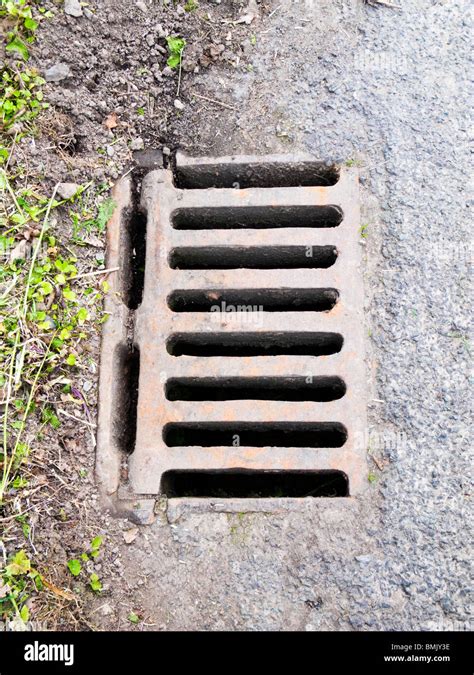 Old iron Road drain cover England UK Stock Photo - Alamy