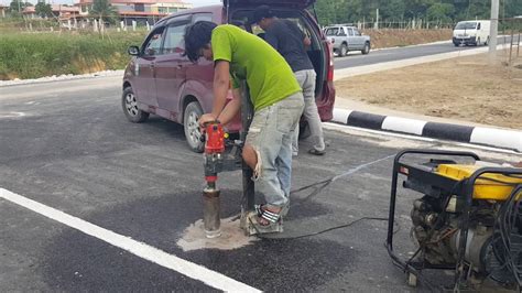 Road Asphalt Core Sampling To Check The Asplalt Thickness The Local