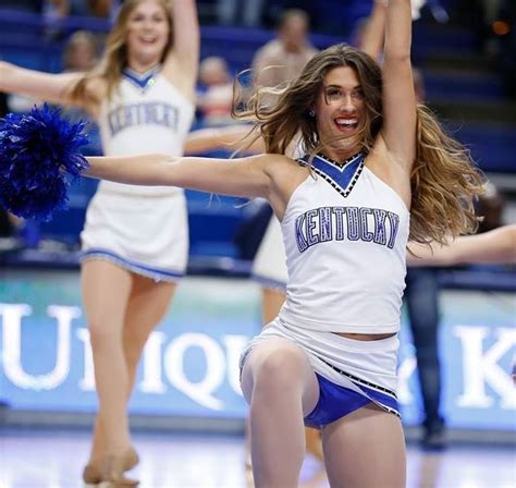 Cheerleaders Perform During A Basketball Game