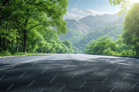 premium photo asphalt road  green forest  mountain nature