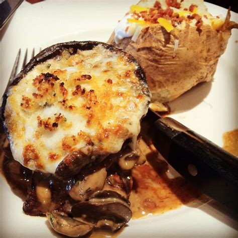 Flat Iron Steak Topped With Cheesy Portobello Loaded Baked Potato At Longhorn Steakhouse