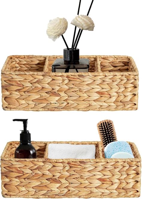 Two Wicker Baskets With Soaps And Toothbrushes In Them