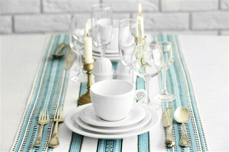 Premium Photo | Beautiful table setting with vintage silverware