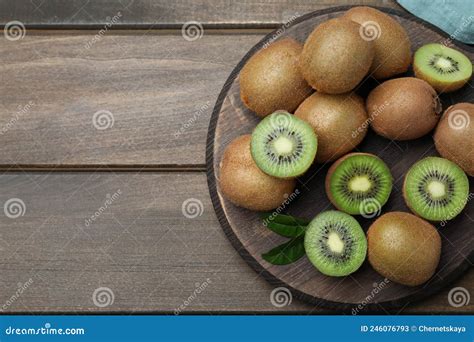 Fresh Ripe Kiwis On Wooden Table Top View Space For Text Stock Image