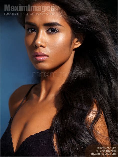 Photo of Beauty portrait of young exotic woman with dark skin and long ...