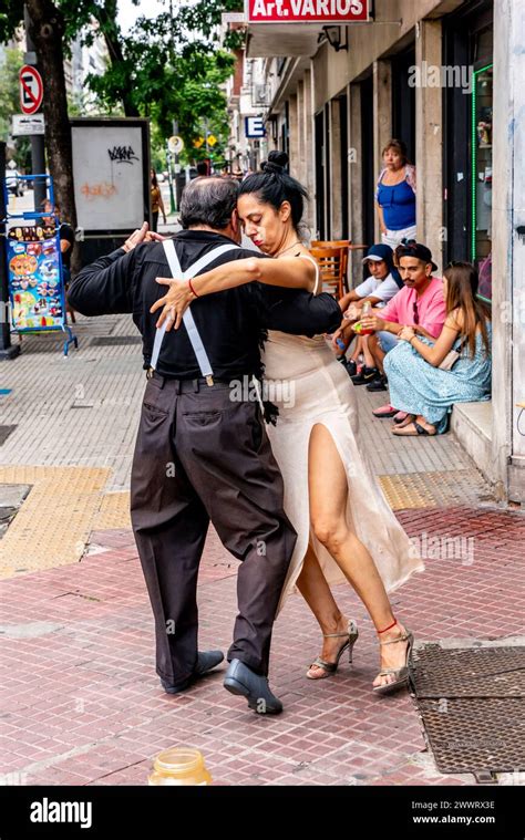 Two Senior Tango Dancers Dancing In The Street San Telmo District