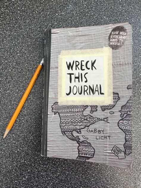 A Notebook With The Words Wreck This Journal Written On It And A Pencil