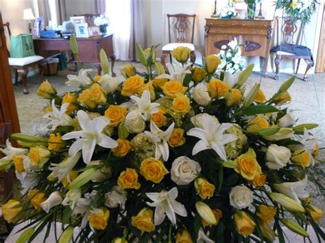 CASKET SPRAY Yellow And White Roses White Lilies Funeral Flower