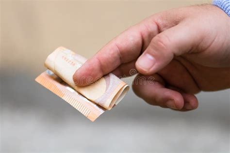 Man Hands Giving Money Like A Bribe Or Tips Holding Euro Banknotes On