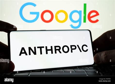 Anthropic AI research company logo seen on the smartphone and GOOGLE ...