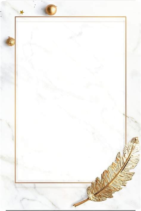 a white marble background with gold accents and a golden feather on the ...