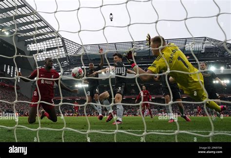 Arsenal goalkeeper Aaron Ramsdale saves from Liverpool's Ibrahima ...