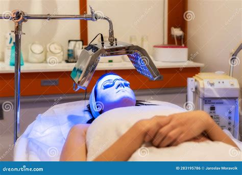 Young Woman Having LED Light Facial Treatment in Beauty Salon Stock ...