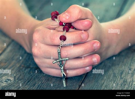 Kids Praying Hands With Rosary