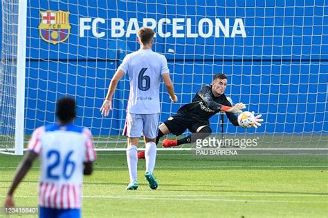 Barcelona's Spanish goalkeeper Inaki Pena stops a shot on goal during ...