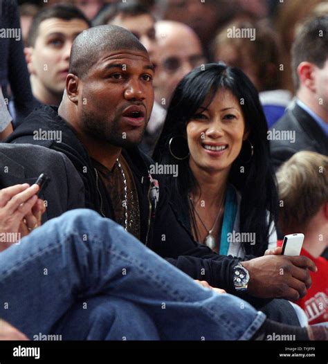 Quinton Rampage Jackson L Watches The New York Knicks Play The