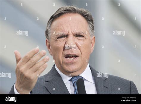 CAQ leader Francois Legault speaks to reporters during a campaign stop in Vaudreuil-Dorion, Que ...