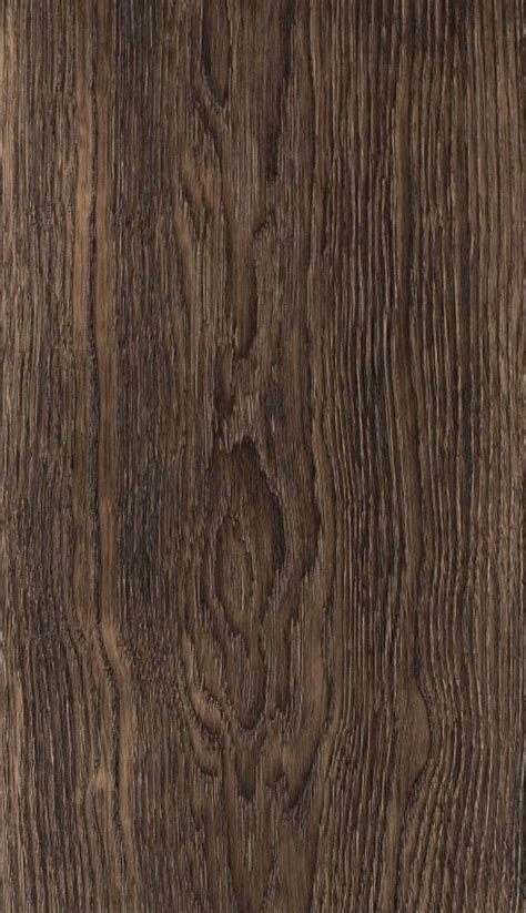 An Image Of Wood Textured With Dark Brown Tones And Grains On The Surface