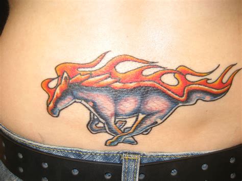 Mustang logo in flames .... wanted this tattoo since I was 16 years old ...