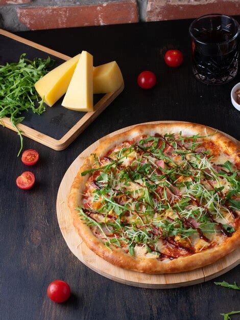 Premium Photo Italian Pizza With Parma Ham And Arugula Cherry