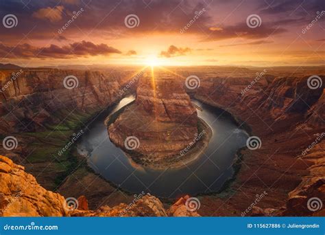 Horseshoe Bend at sunset stock photo. Image of storm - 115627886