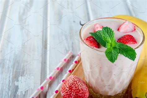 Refreshing pink smoothie featuring smoothie, strawberry, and banana | Food Images ~ Creative Market