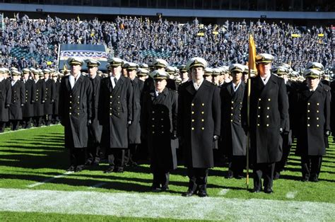 Midshipmen From The Us Naval Academy March Onto The Field At The