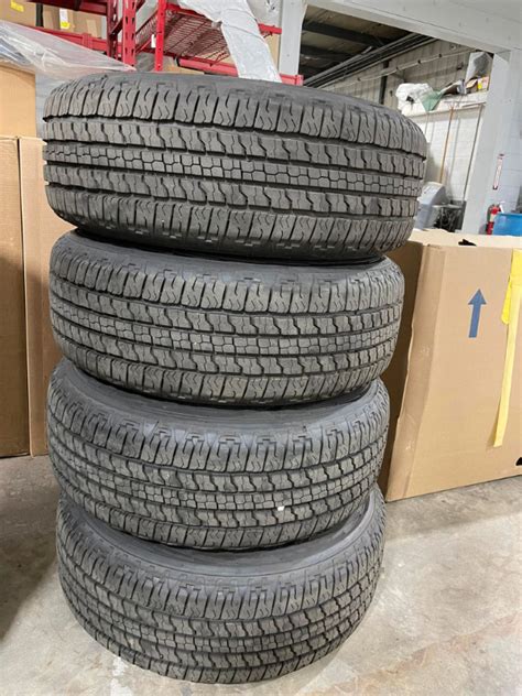 4 Goodyear Wrangler 275/6518 all season tires 275/65/18 | Tires & Rims | Calgary | Kijiji