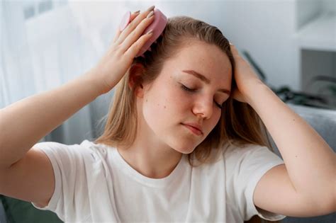 Free Photo Woman Giving Herself Scalp Massage