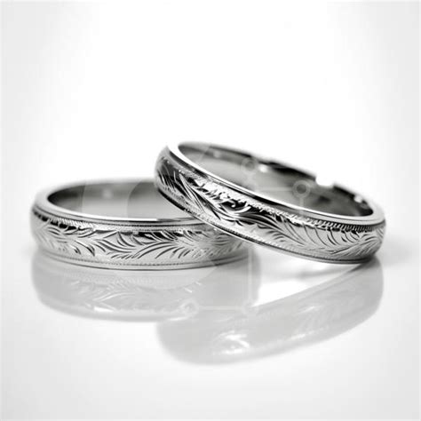 Stunning Image of Silver Wedding Rings with Engraved Floral Design ...