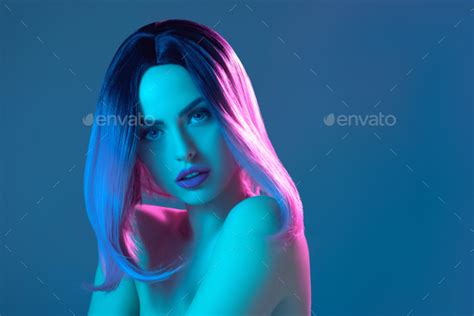 Beautiful Nude Woman In Pink Wig Isolated On Blue With Pink Filter