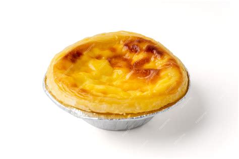 Premium Photo | Half of egg tart or egg custard tart isolated on a ...