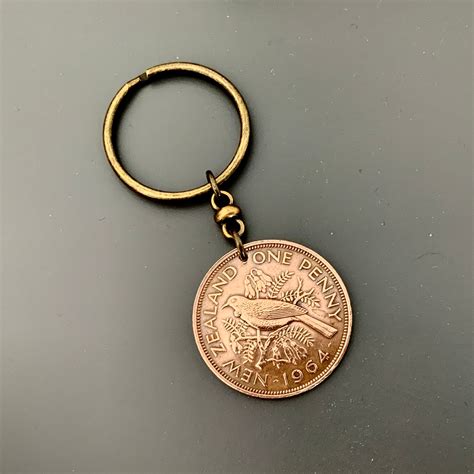 1964 New Zealand Penny Keyring Keychain Or Clip NZ Tui Bird Coin A