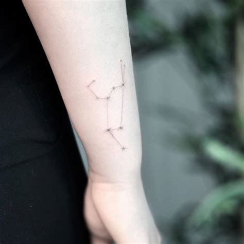 Leo Constellation Tattoo On The Forearm