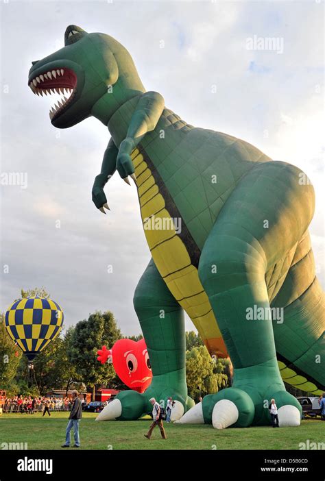 A Dinosaur Balloon Gets Inflated At The 16th Saxonia International