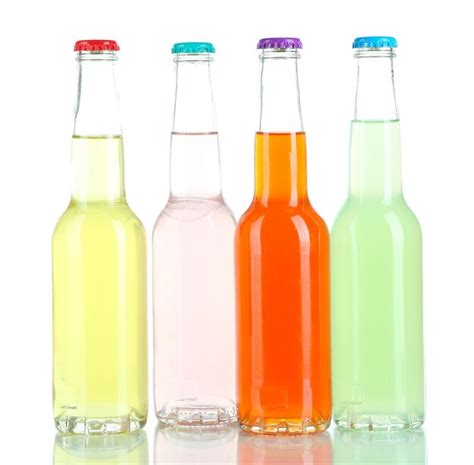 Premium Photo Drinks In Glass Bottles Isolated On White