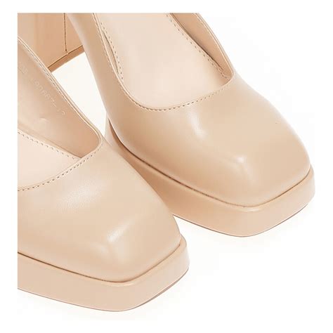 Tsoukalas Обувки на ток mules в цвят nude от изкуствена кожа с платформа в предната част