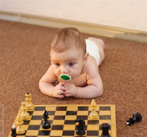 Baby And Chess Stock Photo Adobe Stock