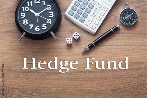 Hedge Fund Words Written On Wooden Table With Clock Dice Calculator Pen