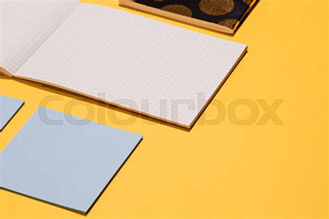 The many notebooks on colored table. memo and planning concept. | Stock image | Colourbox