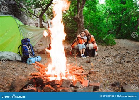 Tent Camping Couple Romantic Sitting by Bonfire Night Countryside Stock Image - Image of cooking ...