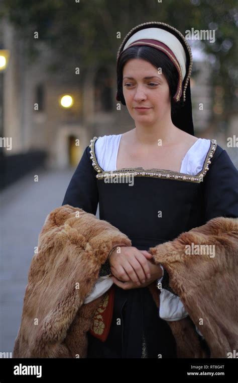 A Beautiful But Sad Dark Haired Tudor Woman In Authentic Tudor Dress