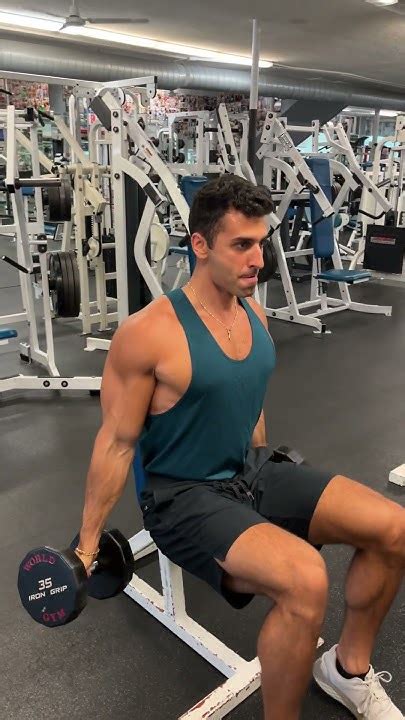 How To Properly Perform Seated Dumbbell Bicep Curls With Good Form