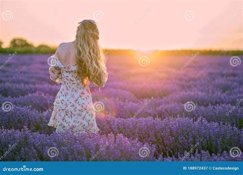 Happy Woman Dancing In A Lavender Field At Sunset Beautiful Flower