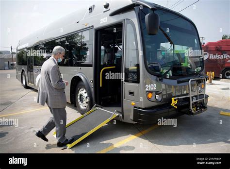 Tulsa Transit General Manager Ted Rieck Boards A New Electric Bus