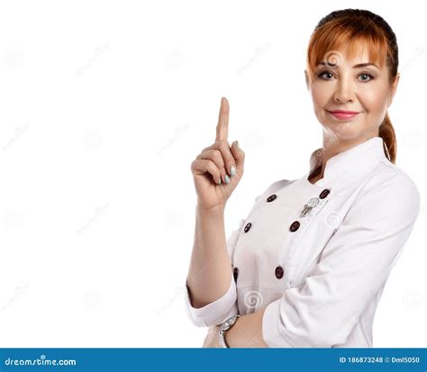 Young Beautiful Smiling Red Haired Woman Doctor Or Nurse In White