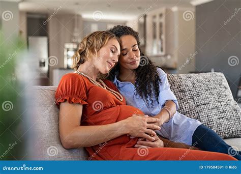 Lovely Pregnant Lesbian Couple At Home Royalty Free Stock Photography CartoonDealer