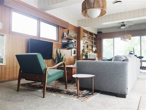 Cozy & Collected Mid-Century Modern Den: Embracing Dated, Original Wood Paneling — Retro Den