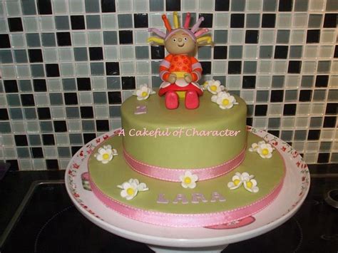 Upsy Daisy Cake - Decorated Cake by acakefulofcharacter - CakesDecor